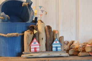 Double Beach Huts On Driftwood