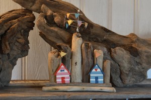 Double Beach Huts On Driftwood